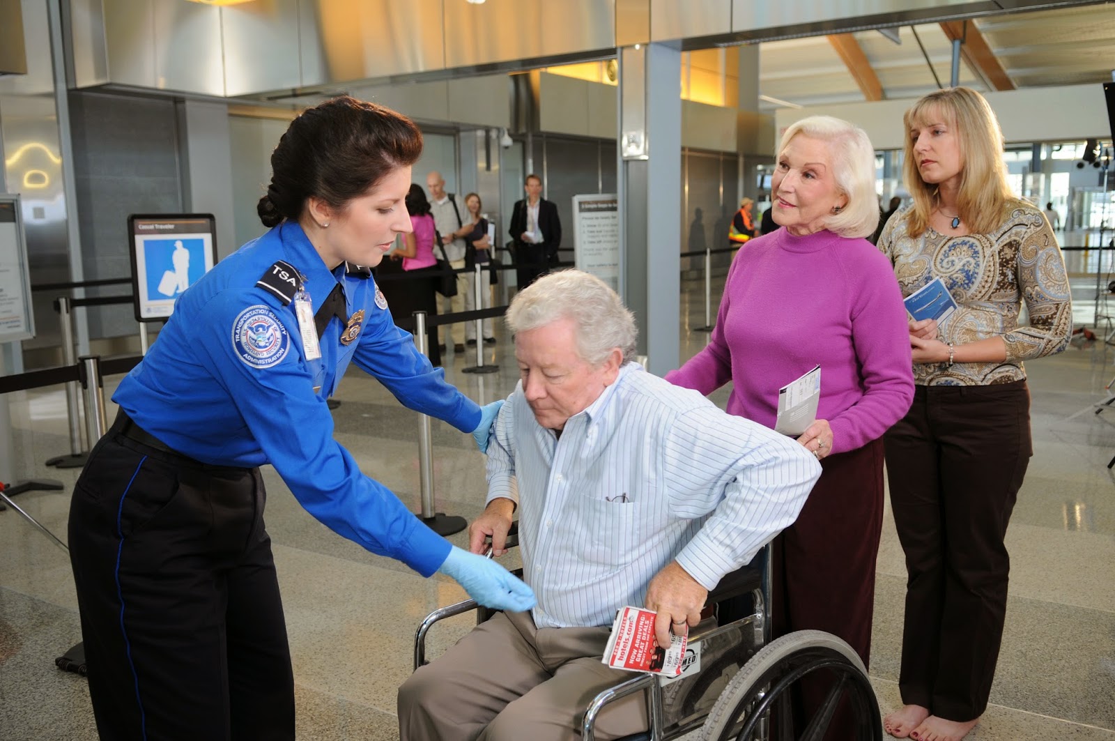 TSA and man in wheelchair